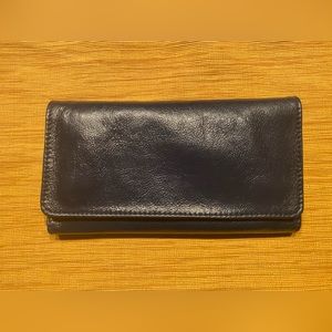 New with tags. Navy trifold wallet.